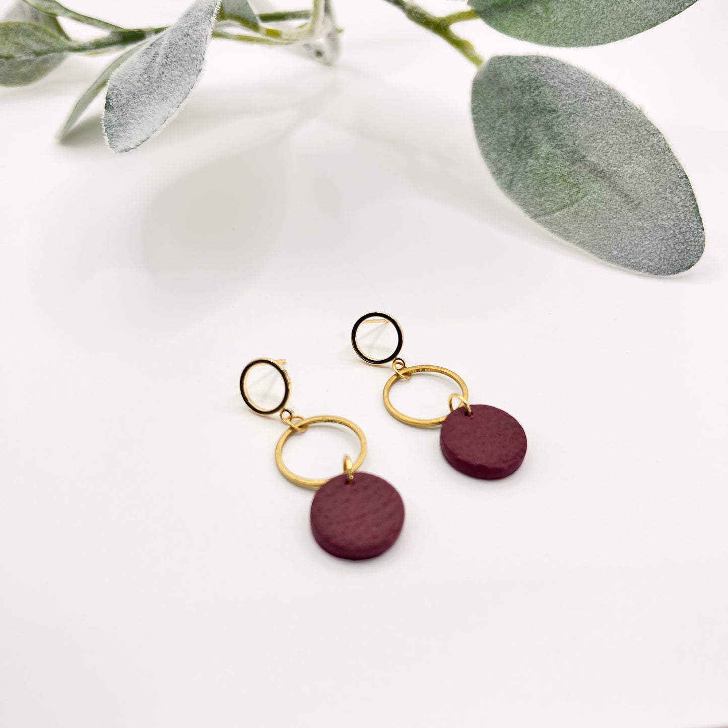 Gold Circular Drops with Leather Details