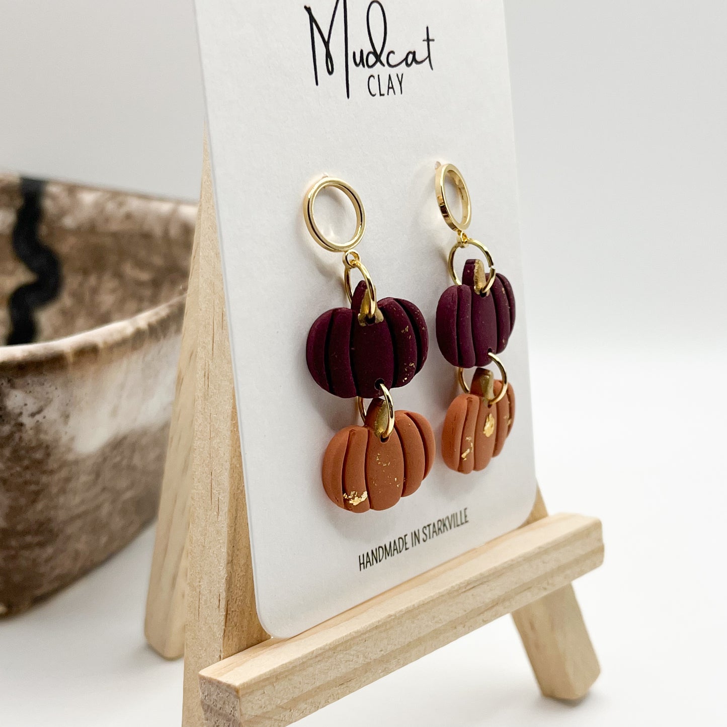 Maroon and Orange Stacked Pumpkins