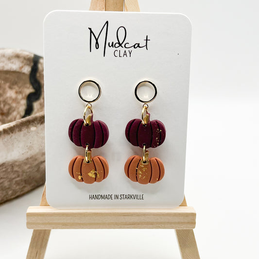 Maroon and Orange Stacked Pumpkins